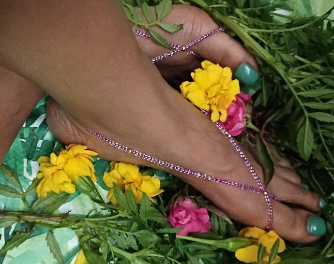 Barefoot Blooms foot jewelry styled with yellow flowers