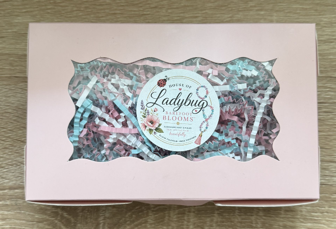 Barefoot Blooms handmade jewelry packaging and display
