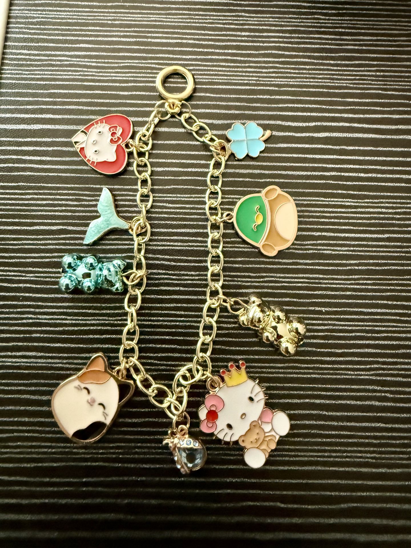 Handmade gold keychain with decorative charms